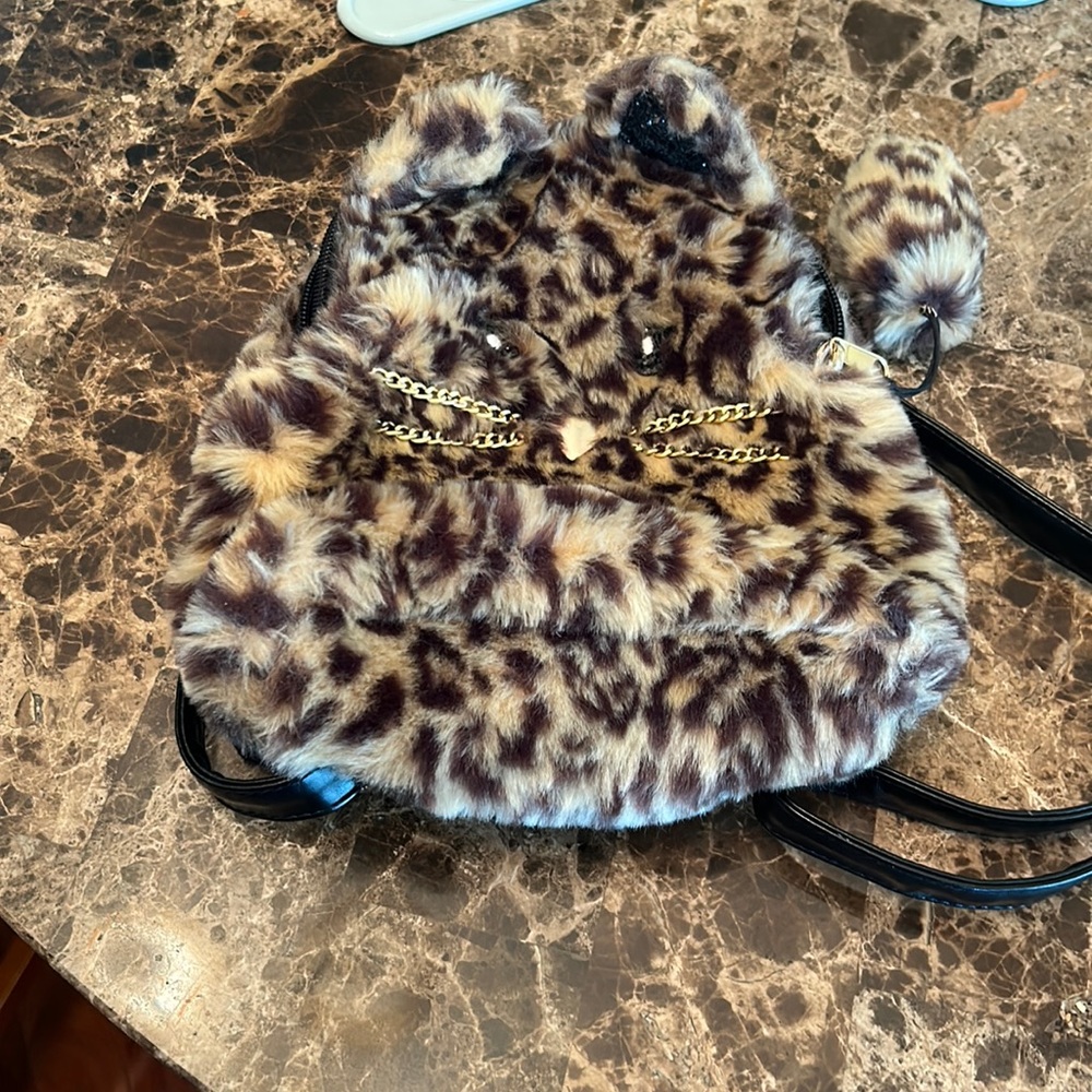 7051 place purse OS
